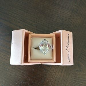 Very large national white quartz and blue diamond ring